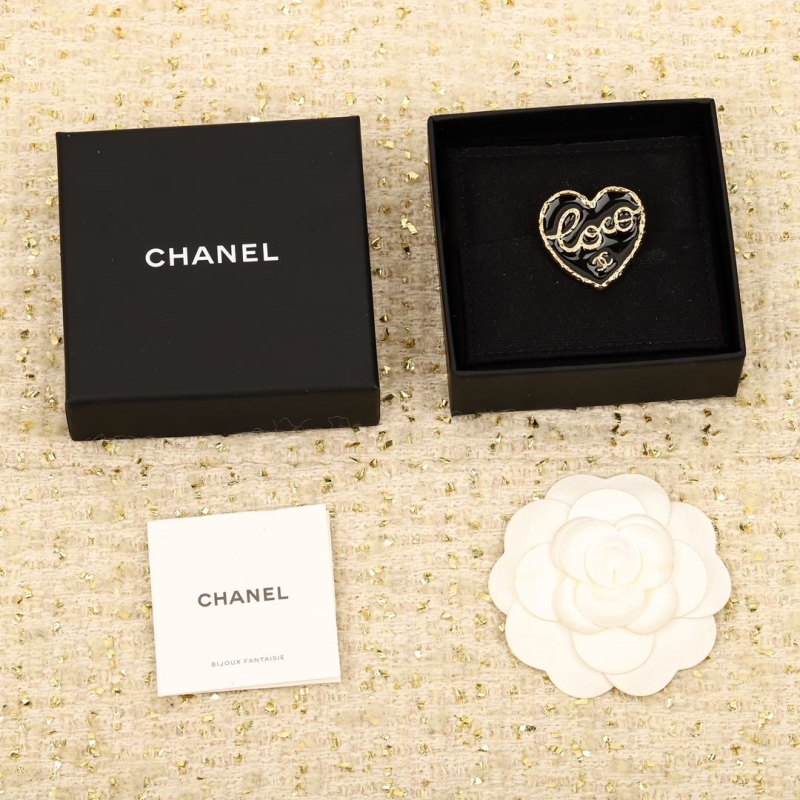 Ch*el brooches